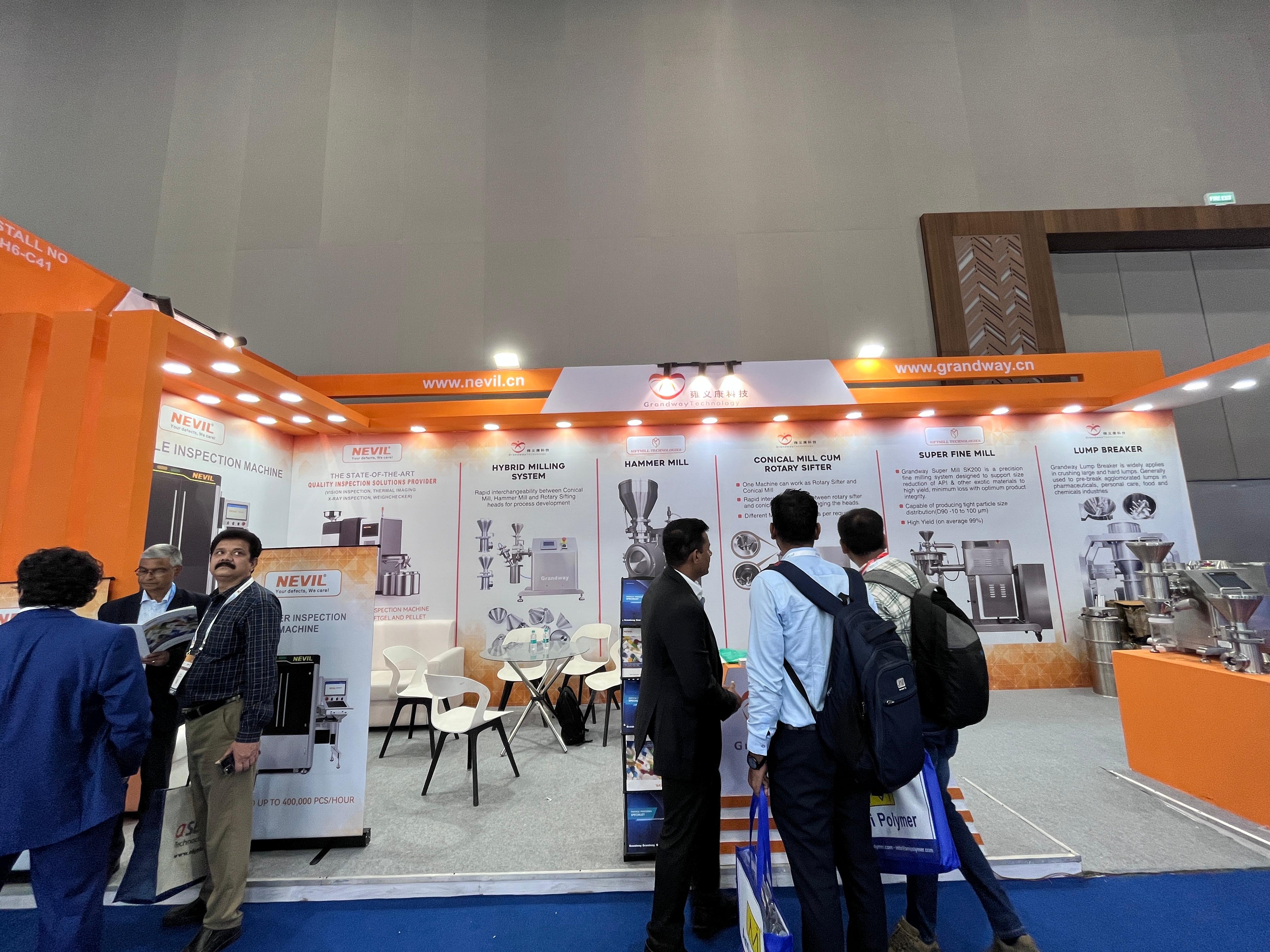 Grandway and Nevil exhibition booth showing pharmaceutical machinery