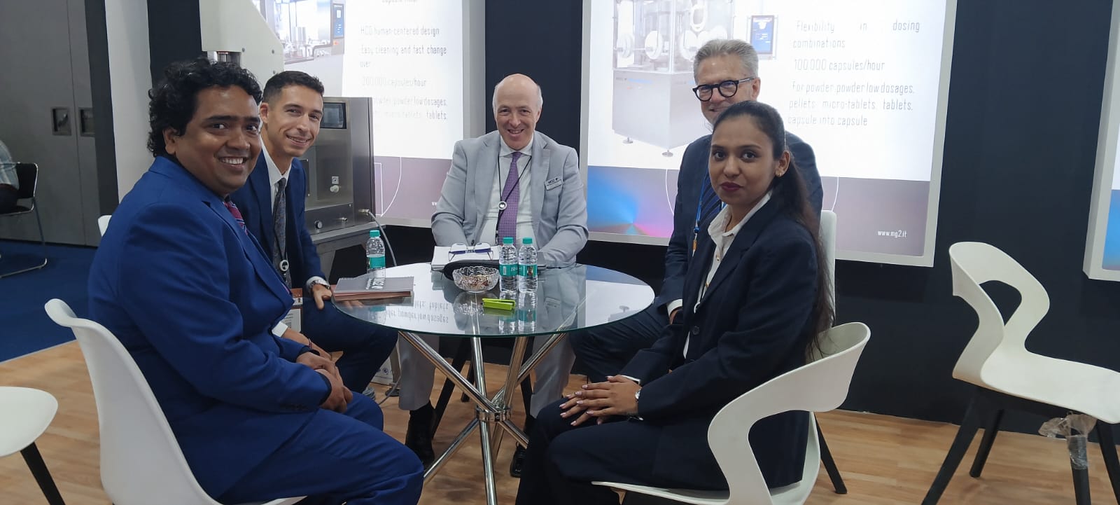 Prospack Solutions team meeting at exhibition booth